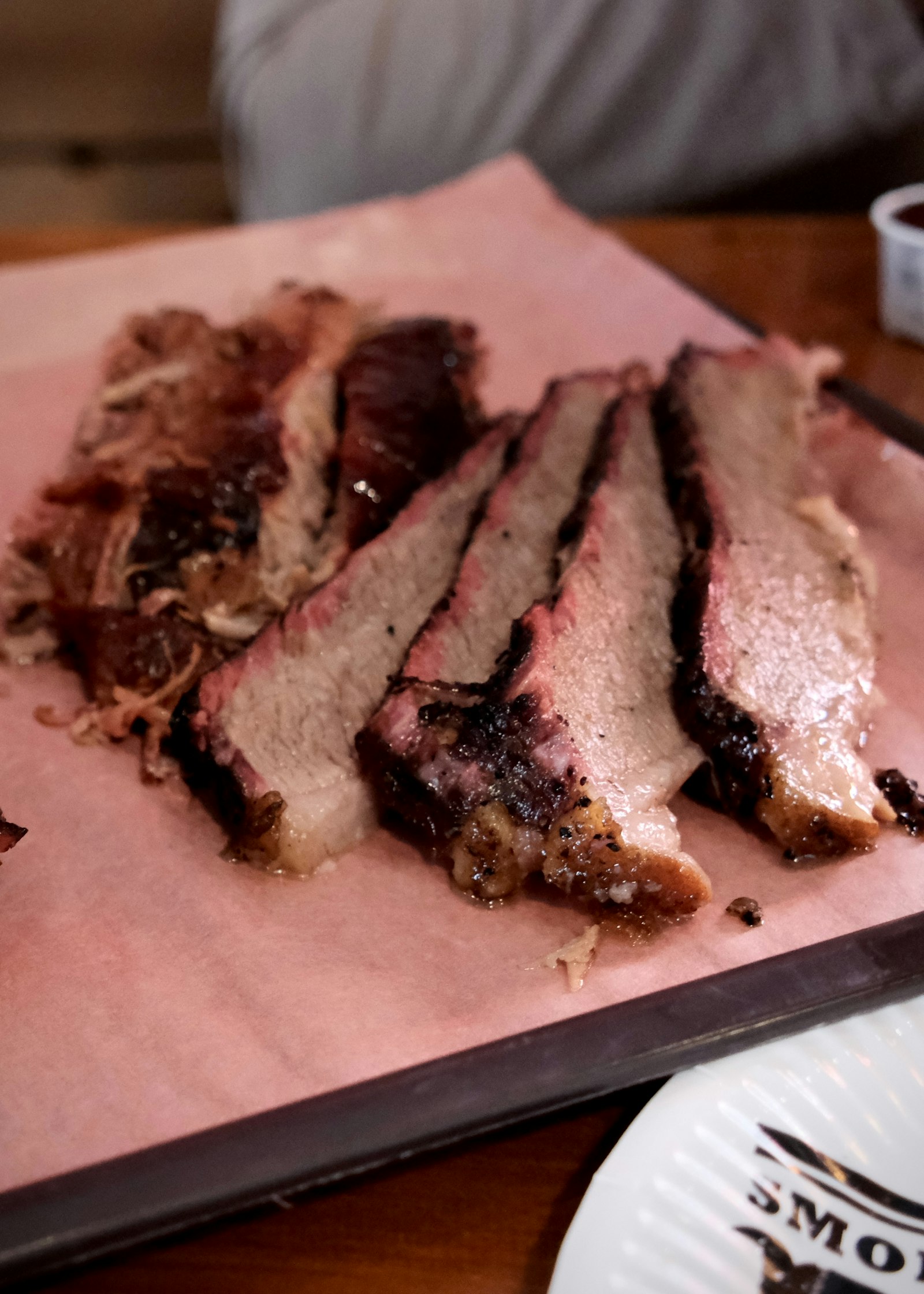 Sliced smoked brisket showing the smoke ring